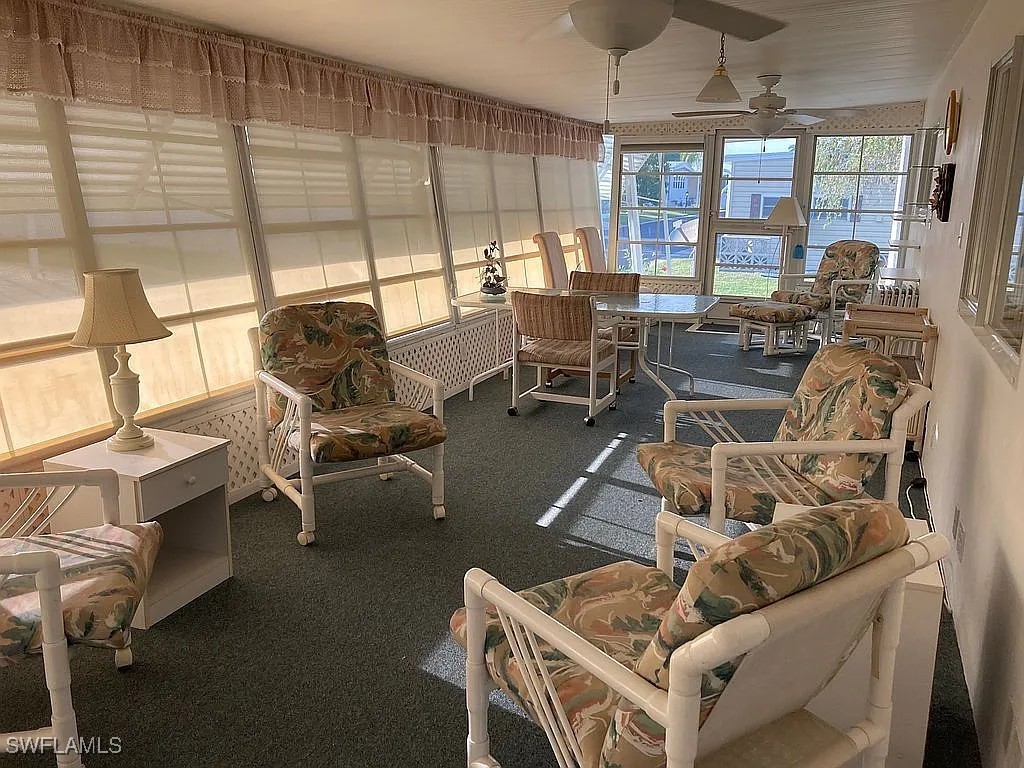 1 Elder Alva, FL 33920 - Photo 11 of 23 a living room with furniture and a large window
