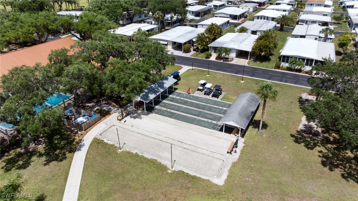 1 Elder Alva, FL 33920 - Photo 14 of 23 an aerial view of a house with a yard and lake view