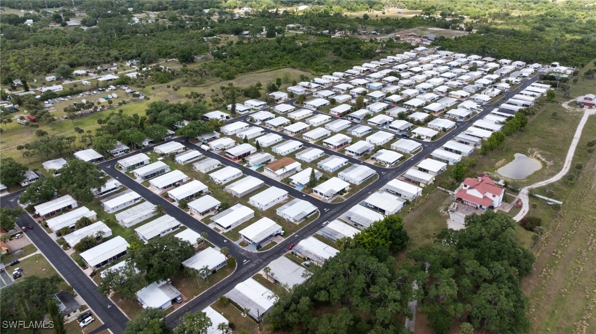 1 Elder Alva, FL 33920 - Photo 20 of 23 a backyard of a house with lots of green space