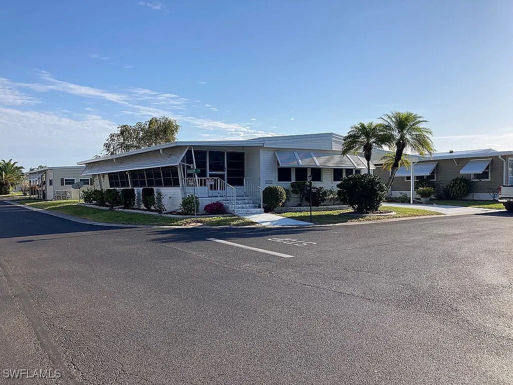 1 Elder Alva, FL 33920 - Photo 2 of 23 a group of people sitting in front of building