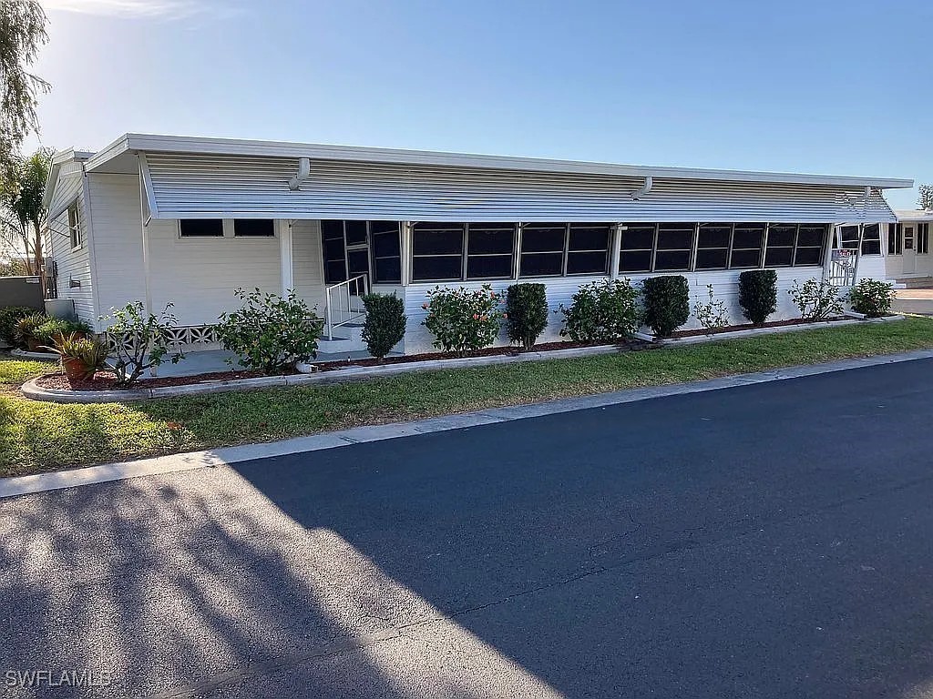 1 Elder Alva, FL 33920 - Photo 3 of 23 front view of a house with a yard