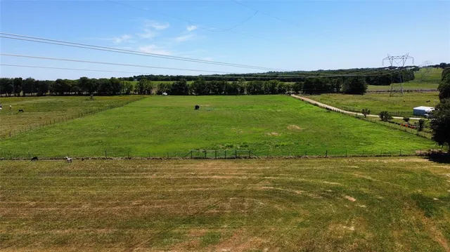 a view of a golf course with a park