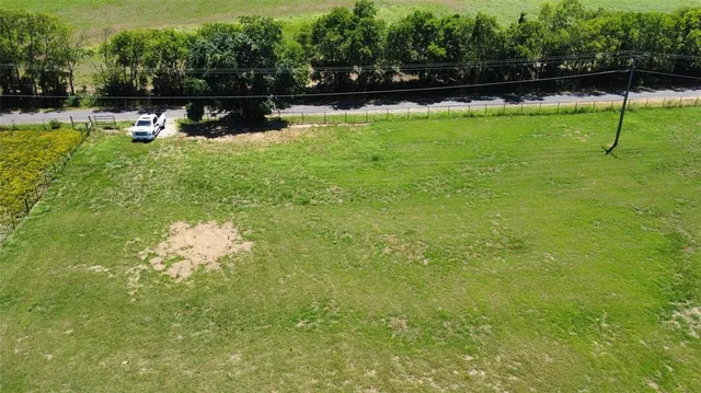 a view of swimming pool with a yard