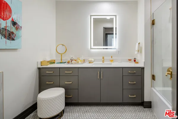 a bathroom with a tub and shower curtain