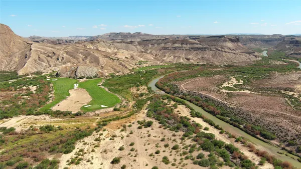 a view of mountains and valleys