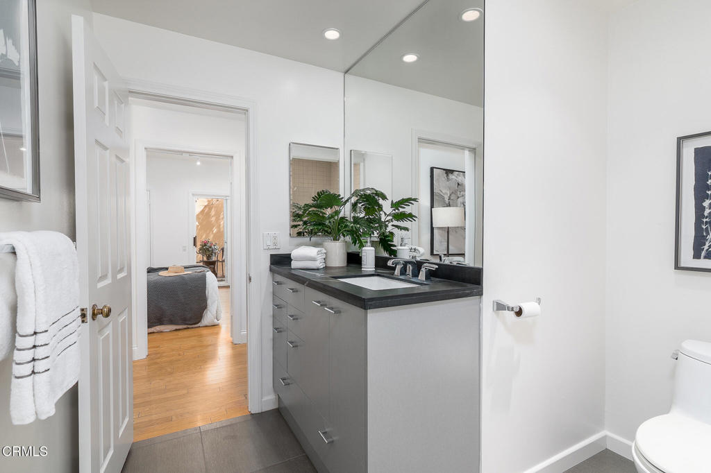 101 Rios Court Solana Beach, CA 92075 - Photo 39 of 67 a kitchen with a sink and refrigerator