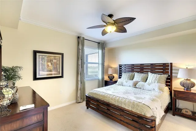 a bathroom with a sink vanity mirror and toilet