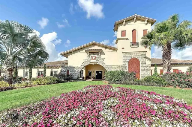 an aerial view of a house with a garden
