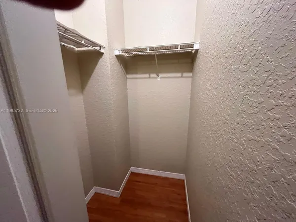 a utility room with a sink dryer and washer