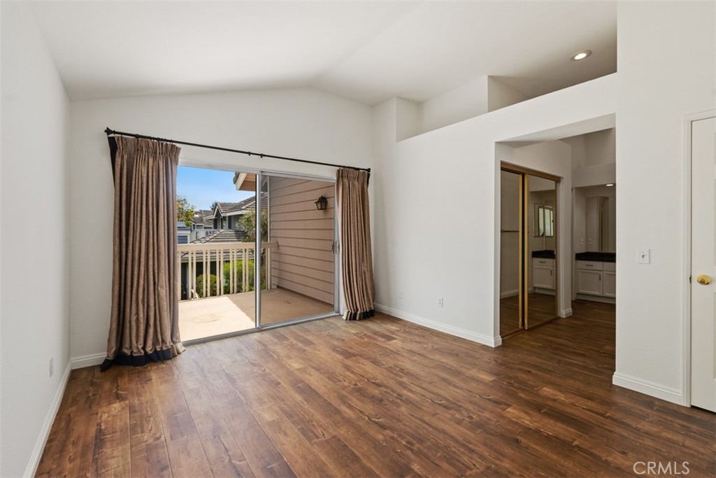 14 Pickney Close Laguna Niguel, CA 92677 - Photo 19 of 22 an empty room with wooden floor and closet