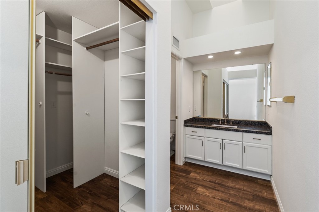 14 Pickney Close Laguna Niguel, CA 92677 - Photo 20 of 22 a spacious bathroom with a granite countertop sink and a mirror