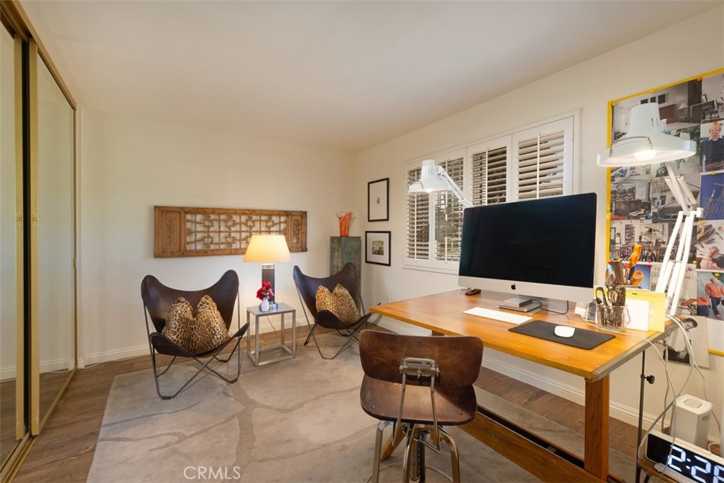 14 Pickney Close Laguna Niguel, CA 92677 - Photo 9 of 22 a view of a workspace with furniture and a couch