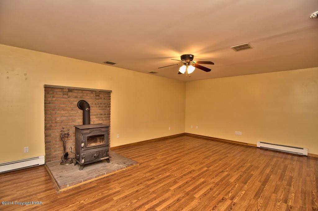 4161 Hickory Road Tobyhanna, PA 18466 - Photo 13 of 31 wooden floor in an empty room with a window