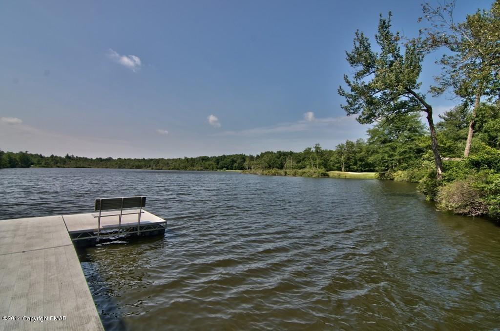4161 Hickory Road Tobyhanna, PA 18466 - Photo 24 of 31 a view of a lake with houses in the back