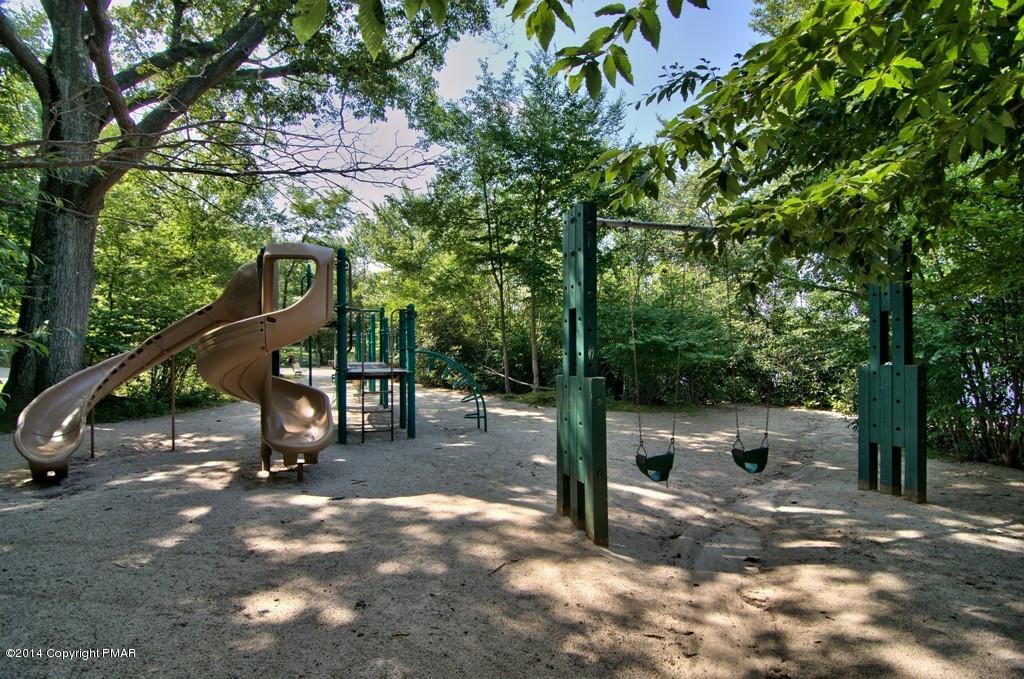 4161 Hickory Road Tobyhanna, PA 18466 - Photo 27 of 31 a view of a park with swings and a table and chairs