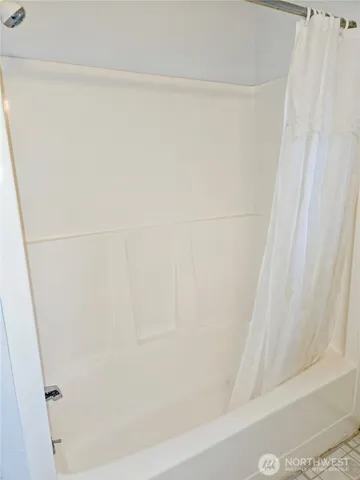 a view of an empty room with window