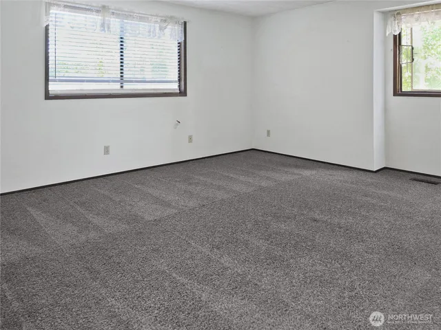 a backyard of a house with lots of green space