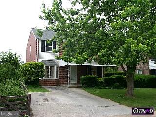 1617 Hampton Road Havertown, PA 19083 - Photo 1 of 1 a front view of a house with a yard