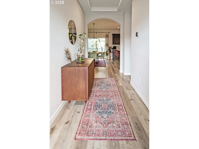 a picture of a living room with a rug