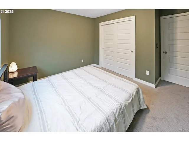 a bathroom with a double vanity sink and mirror