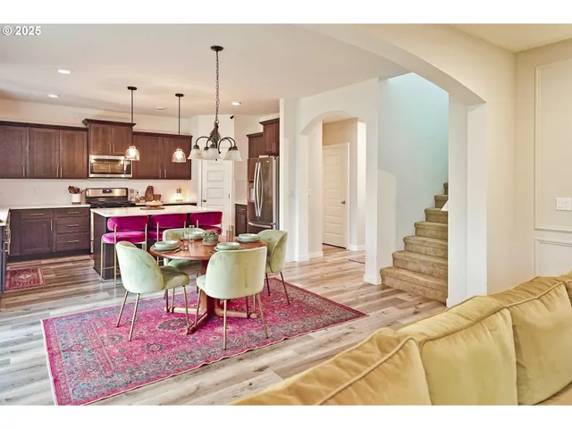 a view of a dining room with furniture