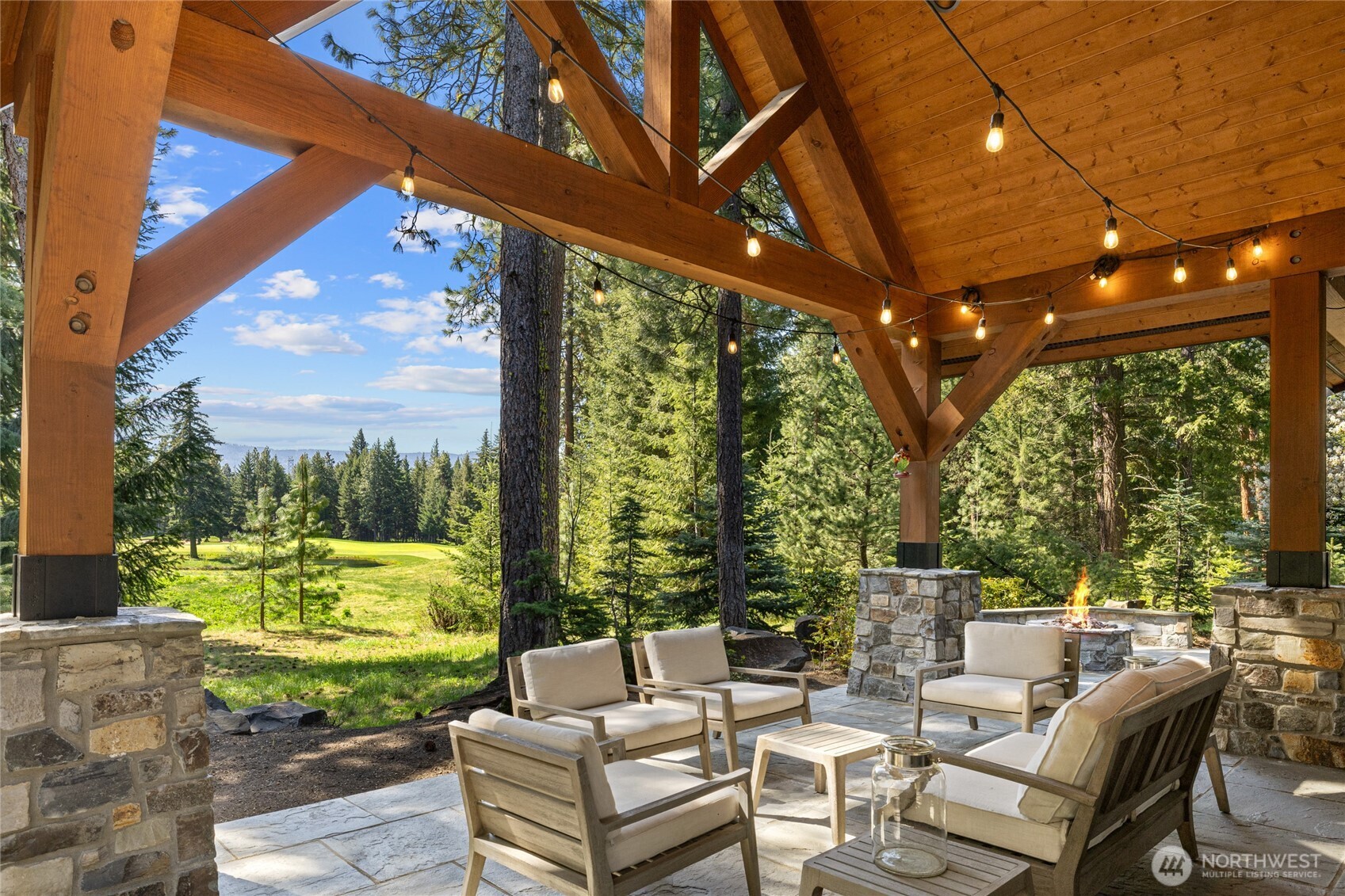 160 Bunchberry Court Cle Elum, WA 98922 - Photo 11 of 40 a view of a patio with table and chairs and potted plants