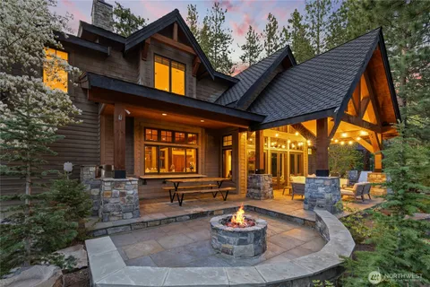 a view of a house with sitting area and furniture