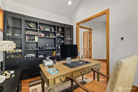 a view of a workspace with furniture