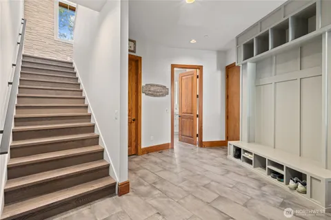 a view of entryway with stairs