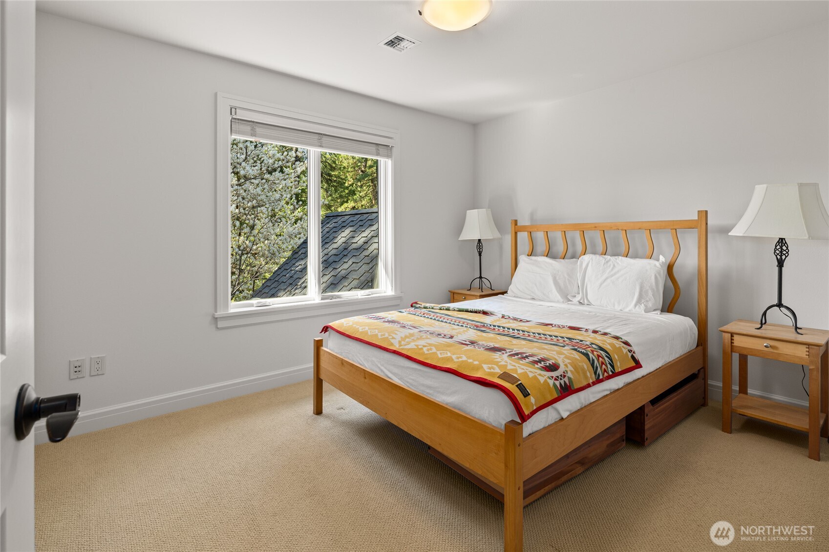 160 Bunchberry Court Cle Elum, WA 98922 - Photo 29 of 40 a bed sitting in a bedroom next to a window
