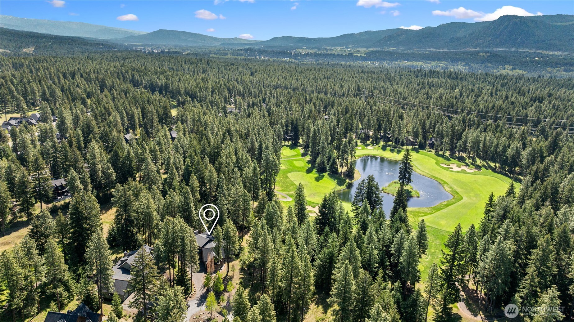 160 Bunchberry Court Cle Elum, WA 98922 - Photo 37 of 40 a view of a lake with a mountain in the background