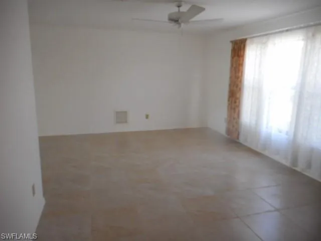 an empty room with a window