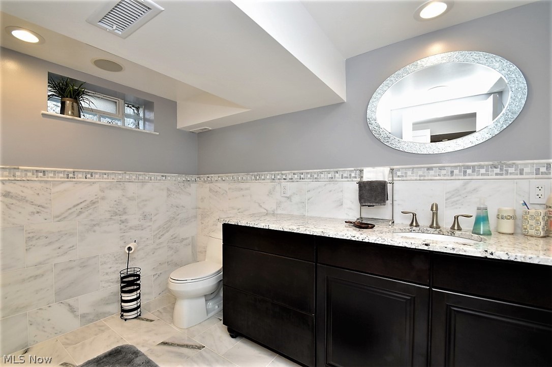 8790 Avery Road Broadview Heights, OH 44147 - Photo 27 of 35 A full bathroom on the lower level provides extra possibilities for out of town visitors during the holidays or a possible in-law suite for expanded families.