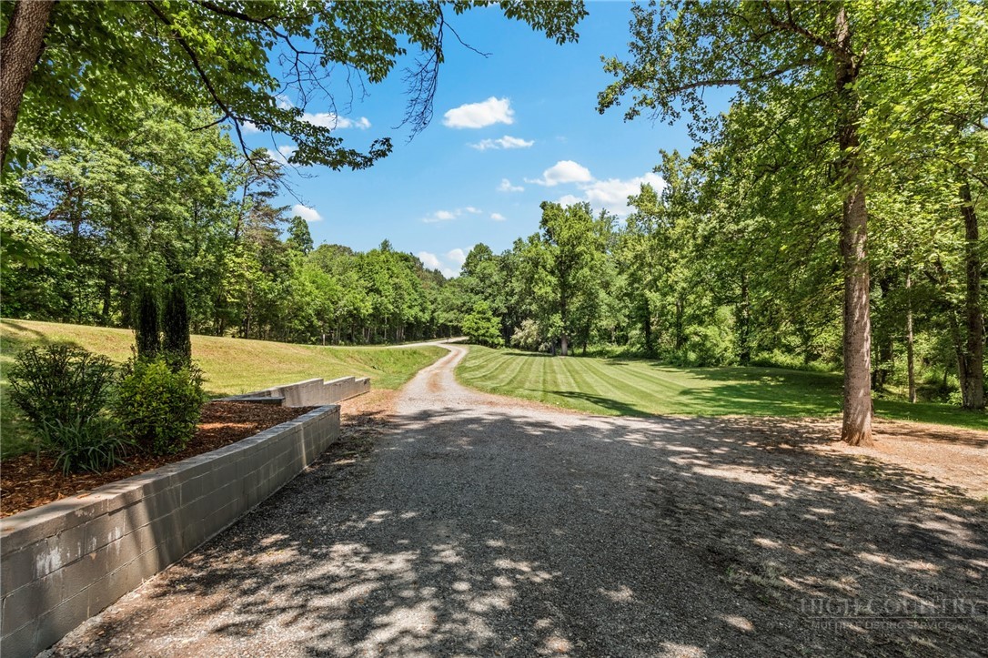 142 Pioneer Road Harmony, NC 28634 - Photo 48 of 49 a view of a yard with swimming pool