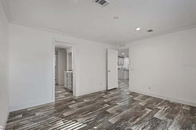a bathroom with a sink double vanity and a mirror