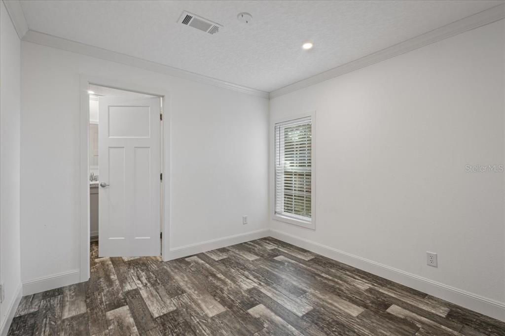 4654 Northwest 45th Avenue Bell, FL 32619 - Photo 21 of 52 a view of an empty room and window
