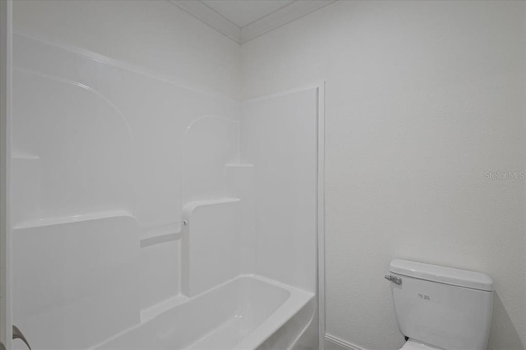 4654 Northwest 45th Avenue Bell, FL 32619 - Photo 26 of 52 a bathroom with a bathtub