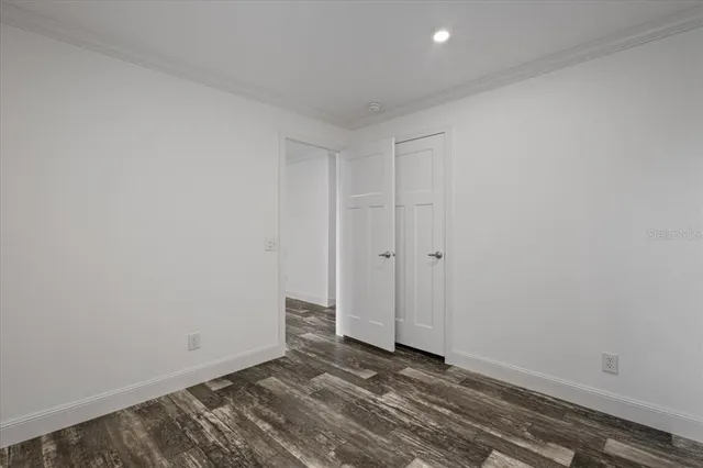 a view of a room that has a window in it