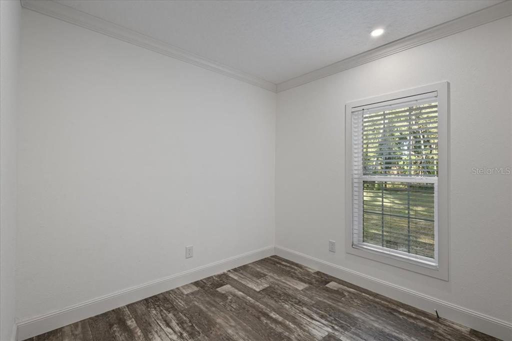 4654 Northwest 45th Avenue Bell, FL 32619 - Photo 29 of 52 a view of a room that has a window in it