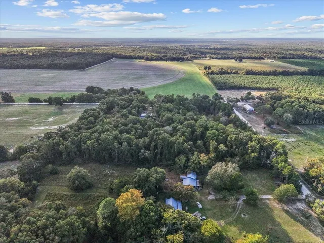 a view of a lake with a yard