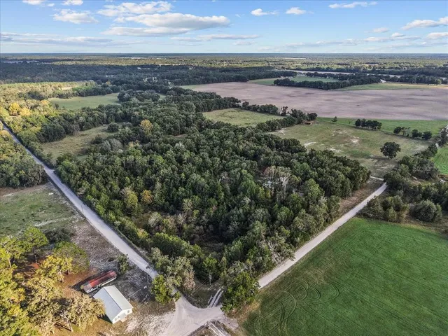a view of a lake with a yard
