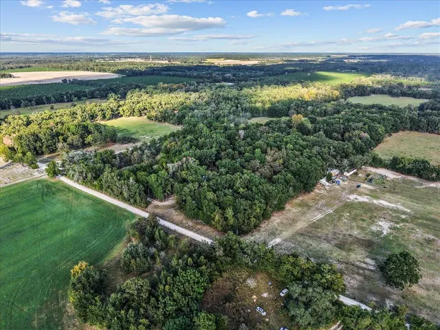 a view of a backyard of the house
