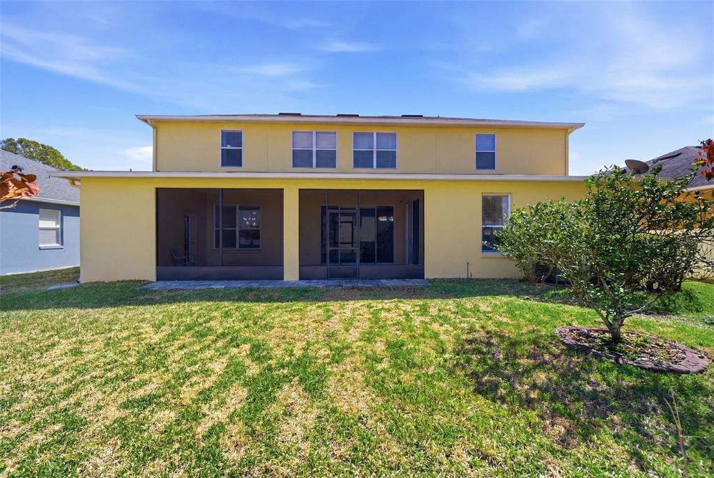 2614 Grapevine Crest Ocoee, FL 34761 - Photo 8 of 24 front view of a house with a yard
