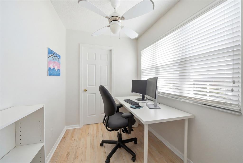 2614 Grapevine Crest Ocoee, FL 34761 - Photo 9 of 24 a view of a workspace with furniture and a window