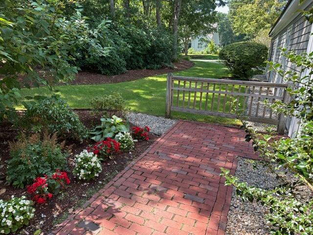 201 Dun Robin Road Mashpee, MA 02649 - Photo 3 of 27 Walkway to Garage