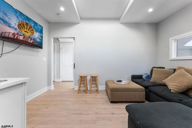 a living room with furniture and a couch