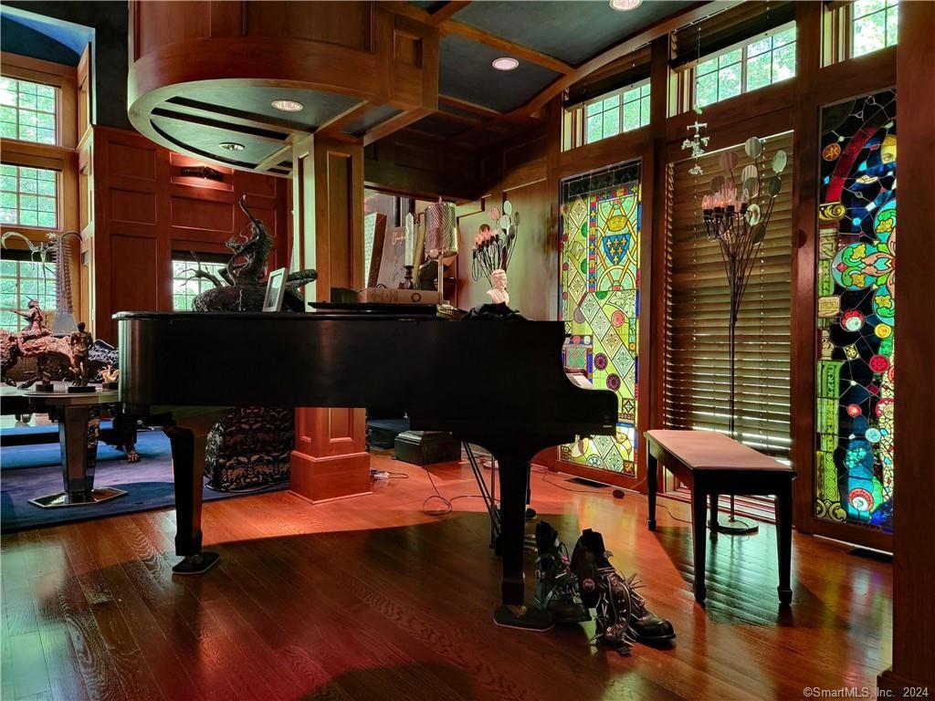 22 Ketcham Road Ridgefield, CT 06877 - Photo 11 of 40 a living room with furniture a window and a potted plant