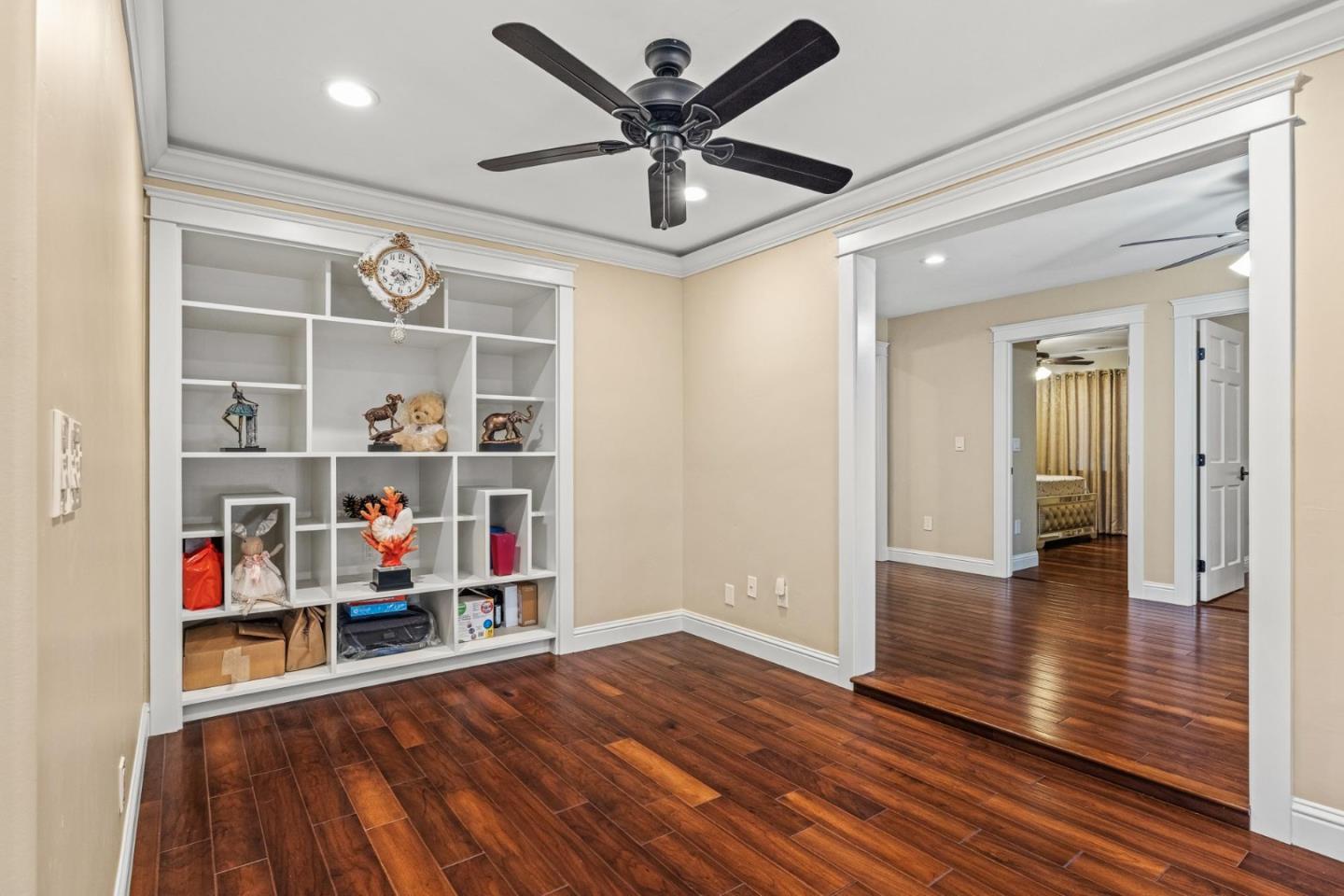 1504 Mable Avenue Modesto, CA 95355 - Photo 21 of 47 a view of empty room with wooden floor and fan
