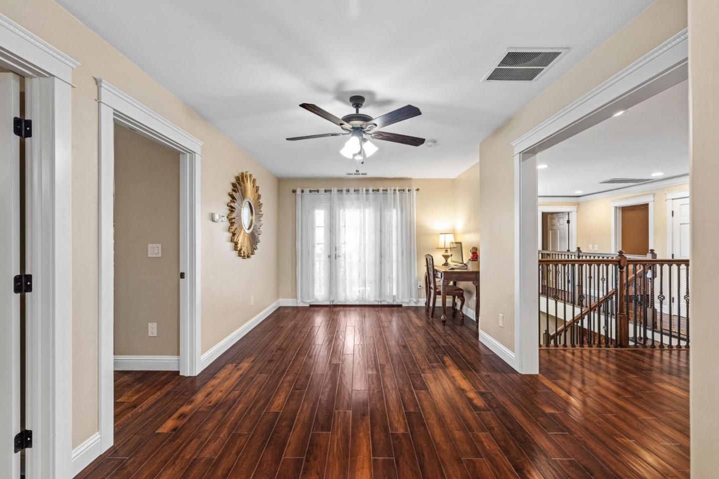 1504 Mable Avenue Modesto, CA 95355 - Photo 23 of 47 a view of an empty room with wooden floor and a window