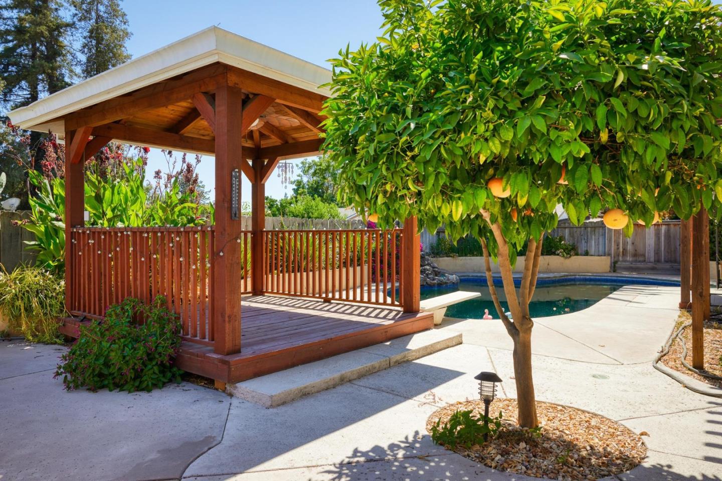 1504 Mable Avenue Modesto, CA 95355 - Photo 28 of 47 a front view of a house with garden